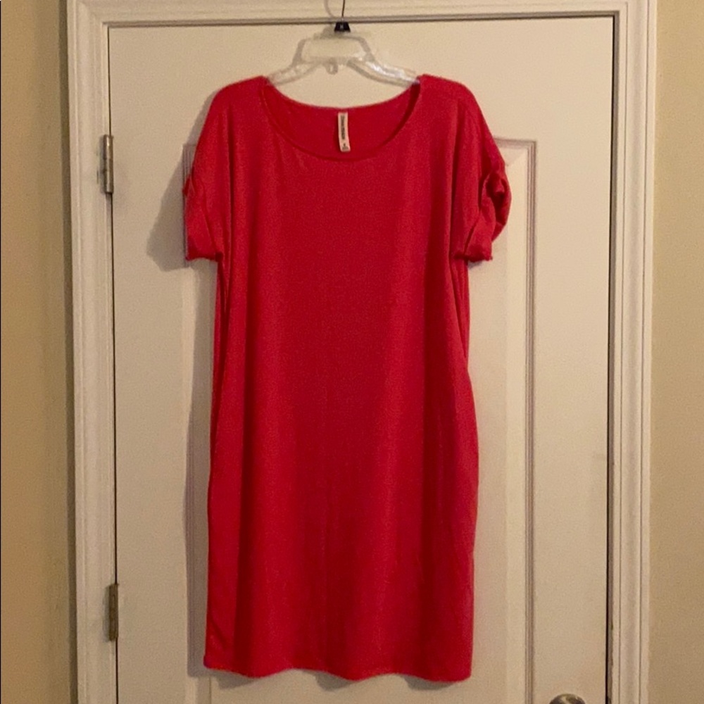 New without tags pink dress med with pockets!